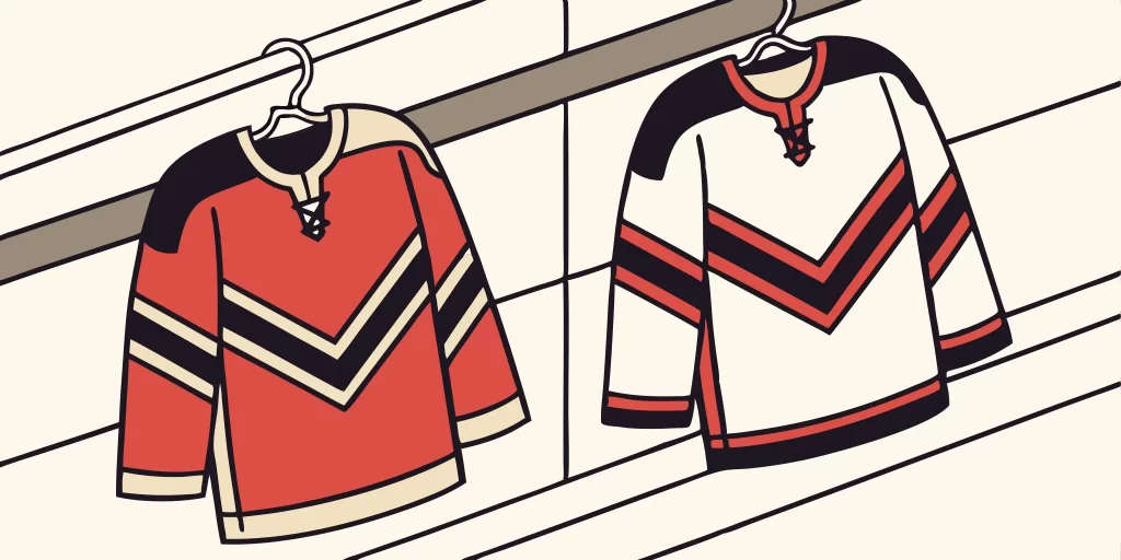 Custom Pittsburgh Penguins jerseys with red, black, and white chevron designs.