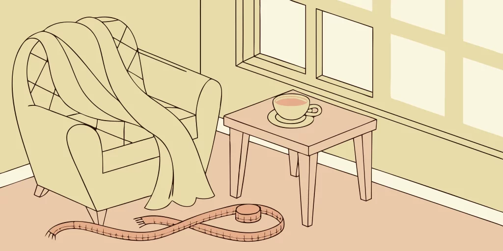 Sweater size chart with tape measure.